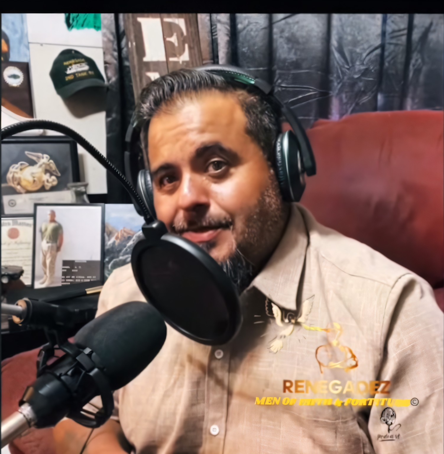 Preacher Joe recording behind the microphone for Renegadez: Men of Faith & Fortitude